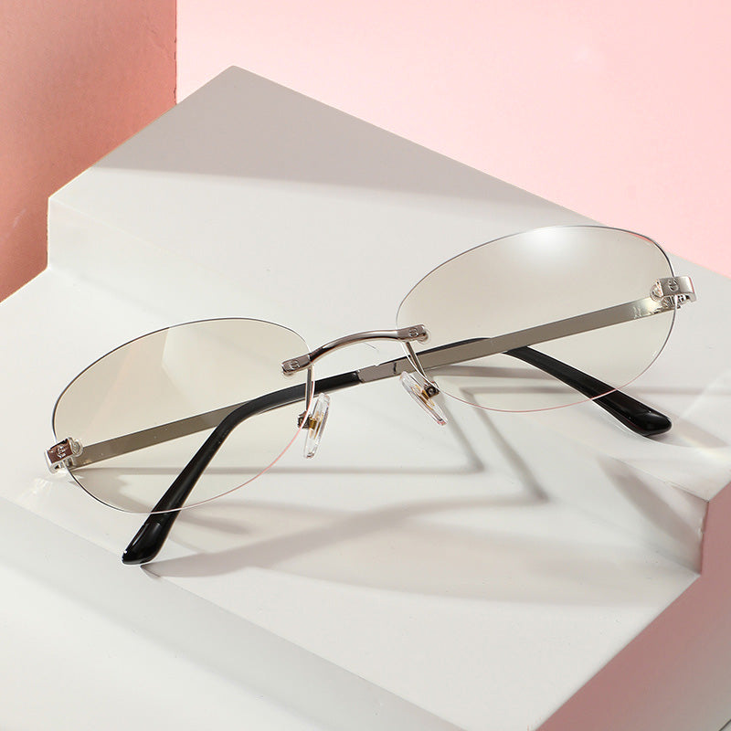Fashion Small Oval Rimless Sunglasses